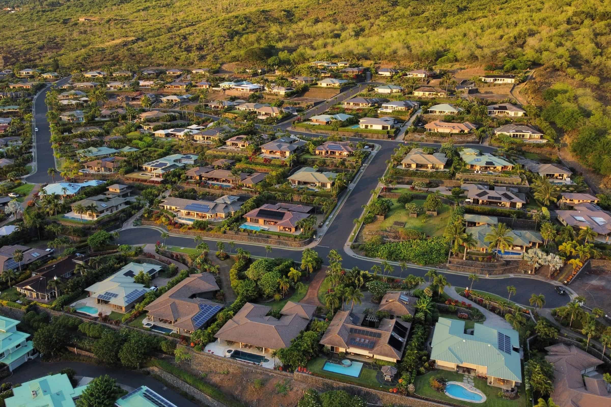 Aerial view of upscale residential community on Big Island, Kona, Kohala Coast, with ocean views and.