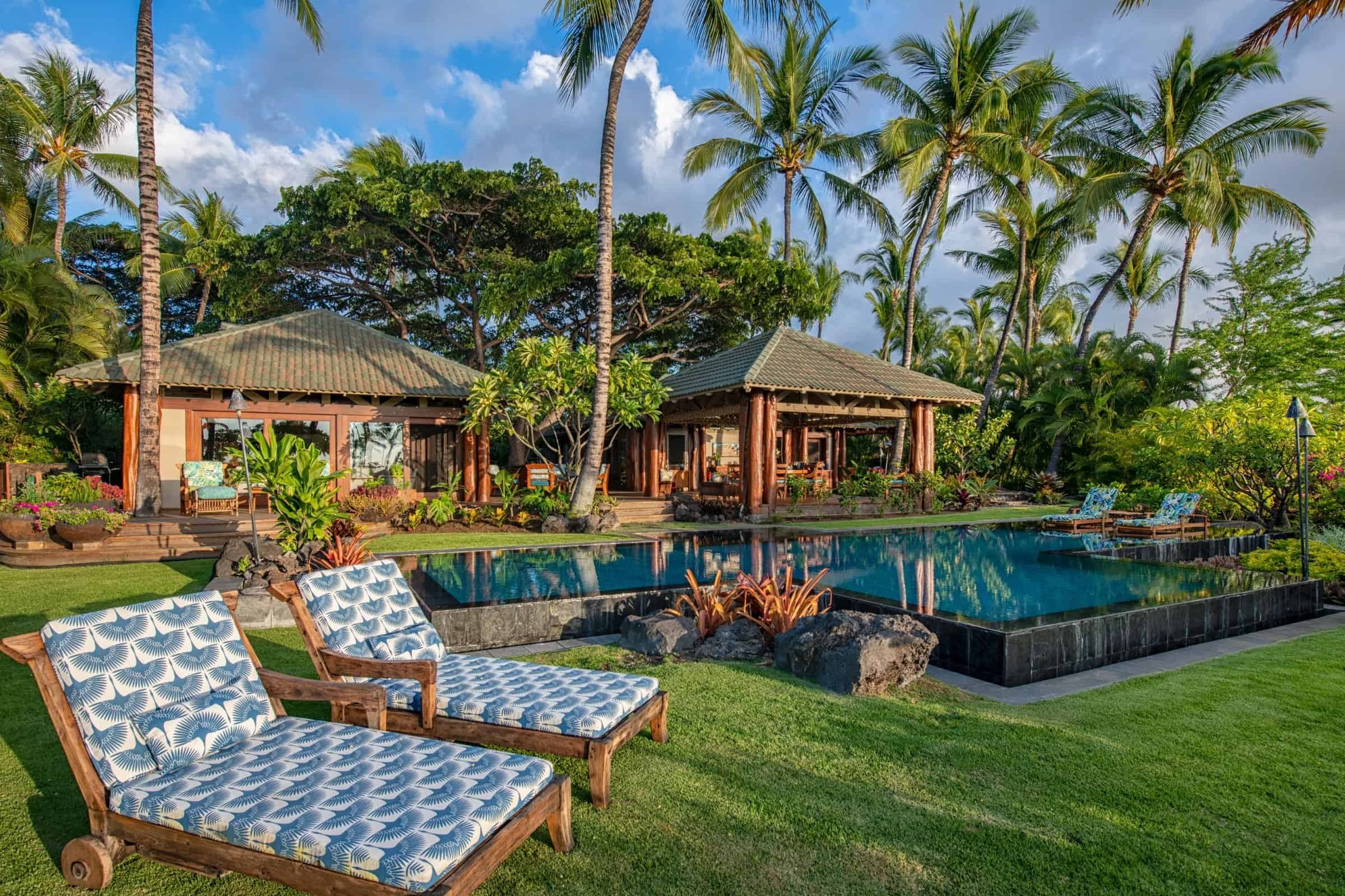 Lanai, pool and lounge seating at a home in Mauna Lani Resort on the Kohala Coast.