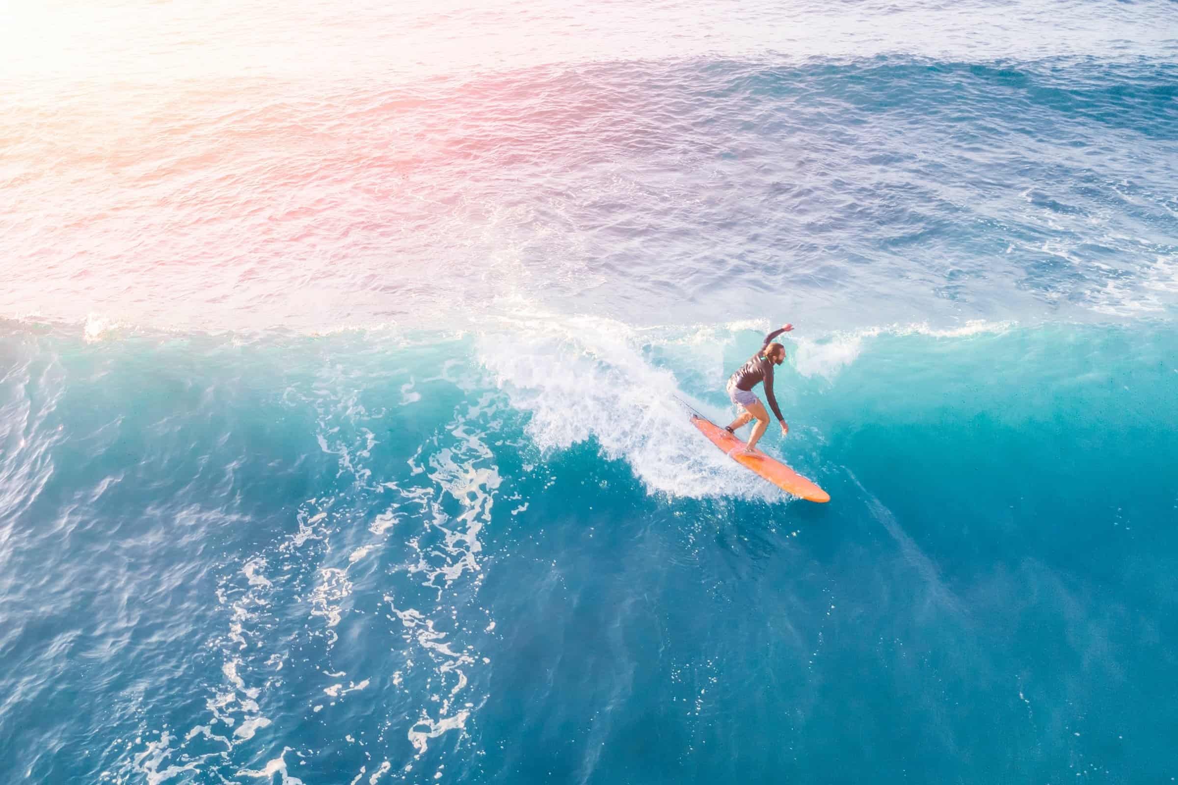 Oceanfront property in Kona with stunning views and access to world-class surfing spots.