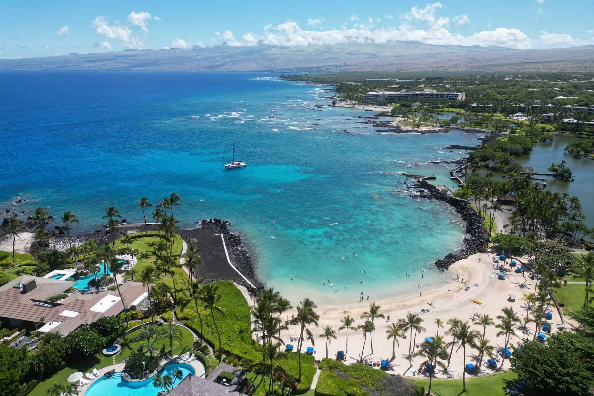 Beachfront estate on Big Island, Hawaii with ocean views, lush gardens, and luxury amenities.