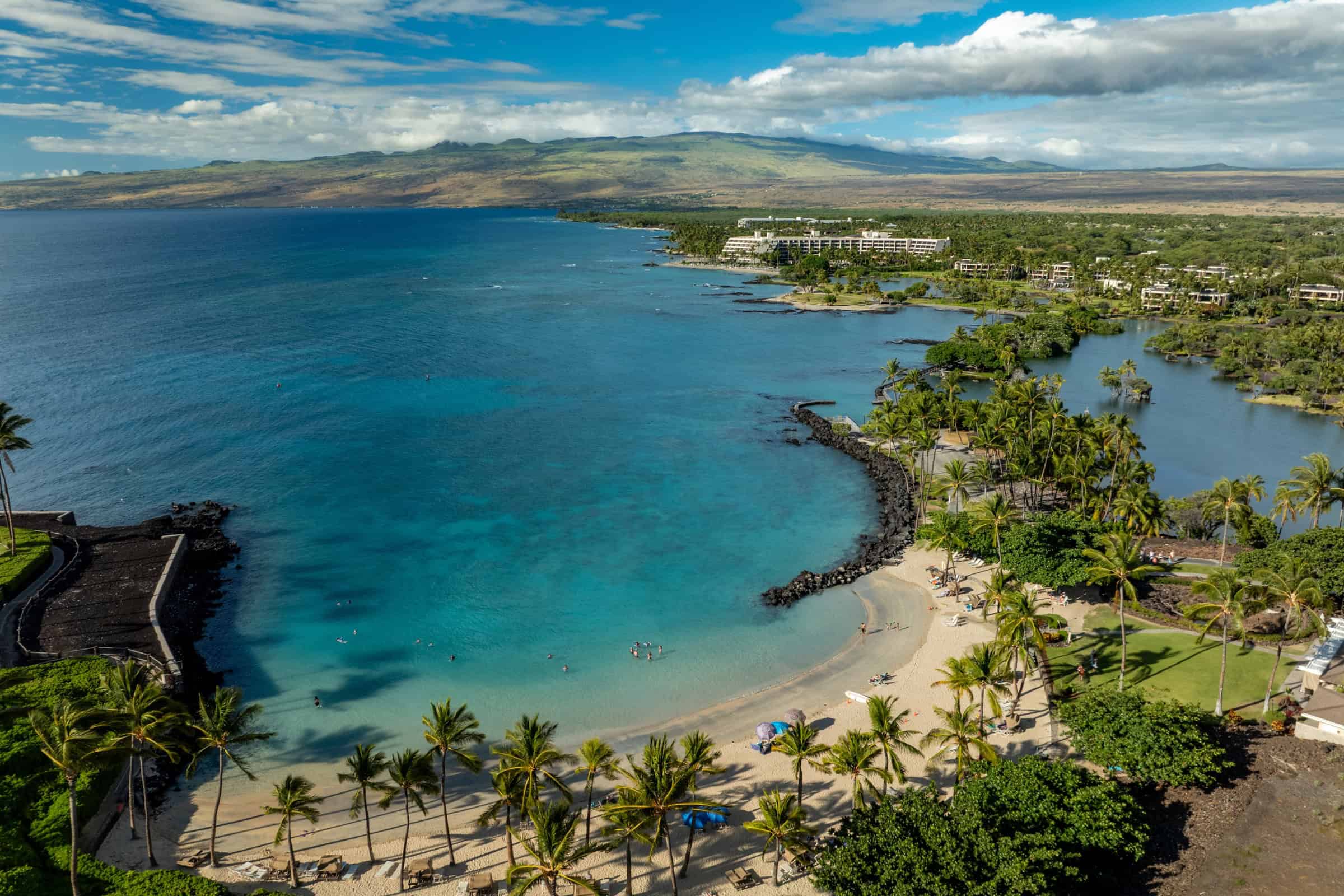 Aerial of the calm beach and bay at Mauna Lani on the Kohala Coast.