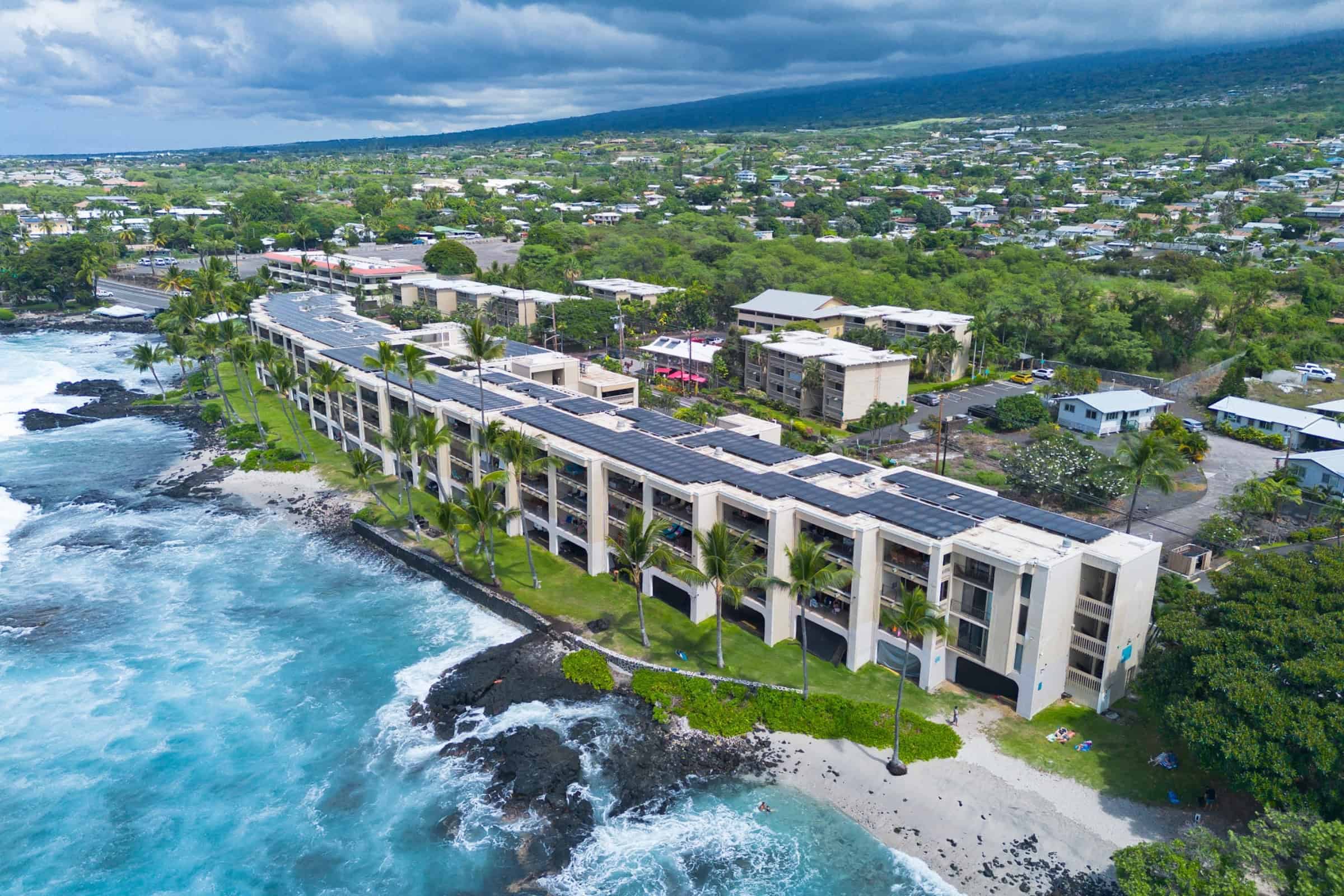 Luxury oceanfront condos in Kohala Coast with resort amenities and stunning coastline views.