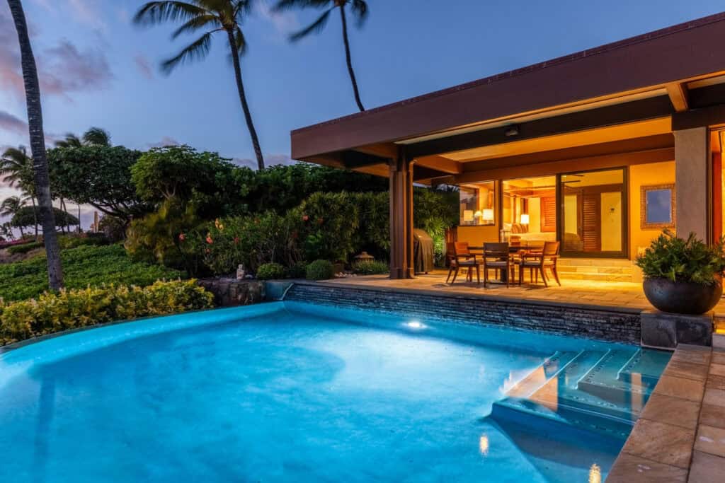 Big Island Hawaii real estate, oceanfront home in Kohala Coast with pool and resort lifestyle.