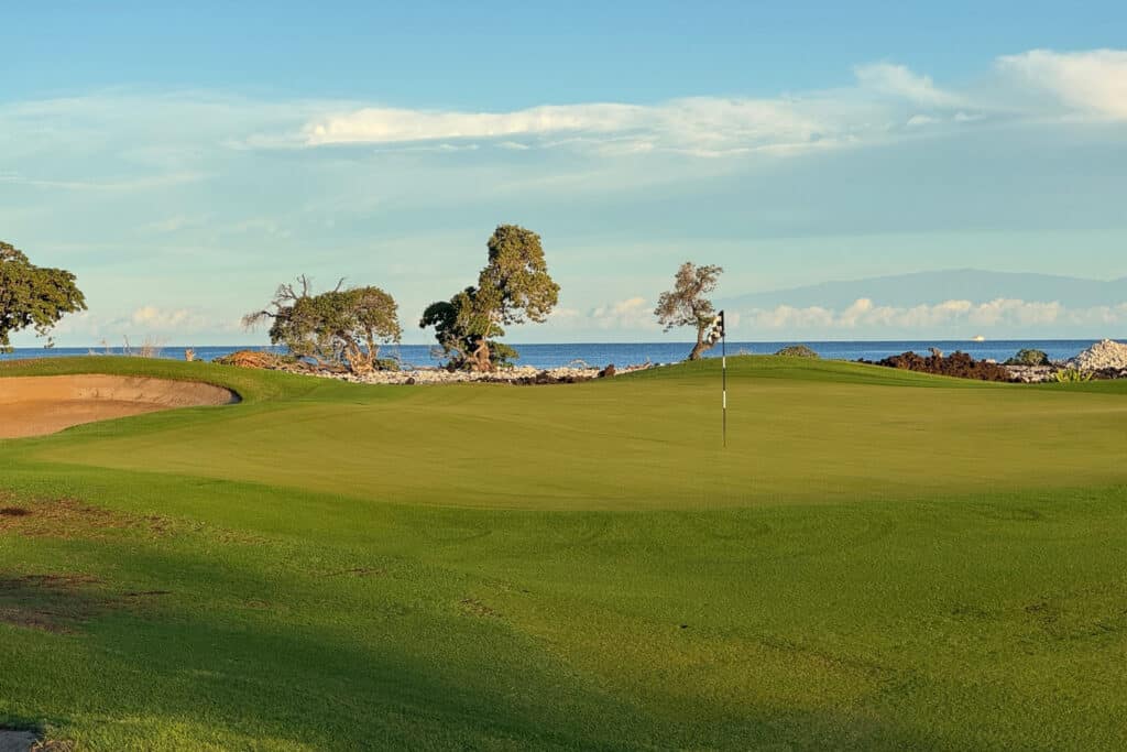 Luxury golf course in Kohala Coast, Big Island Hawaii with ocean views and lush greens.