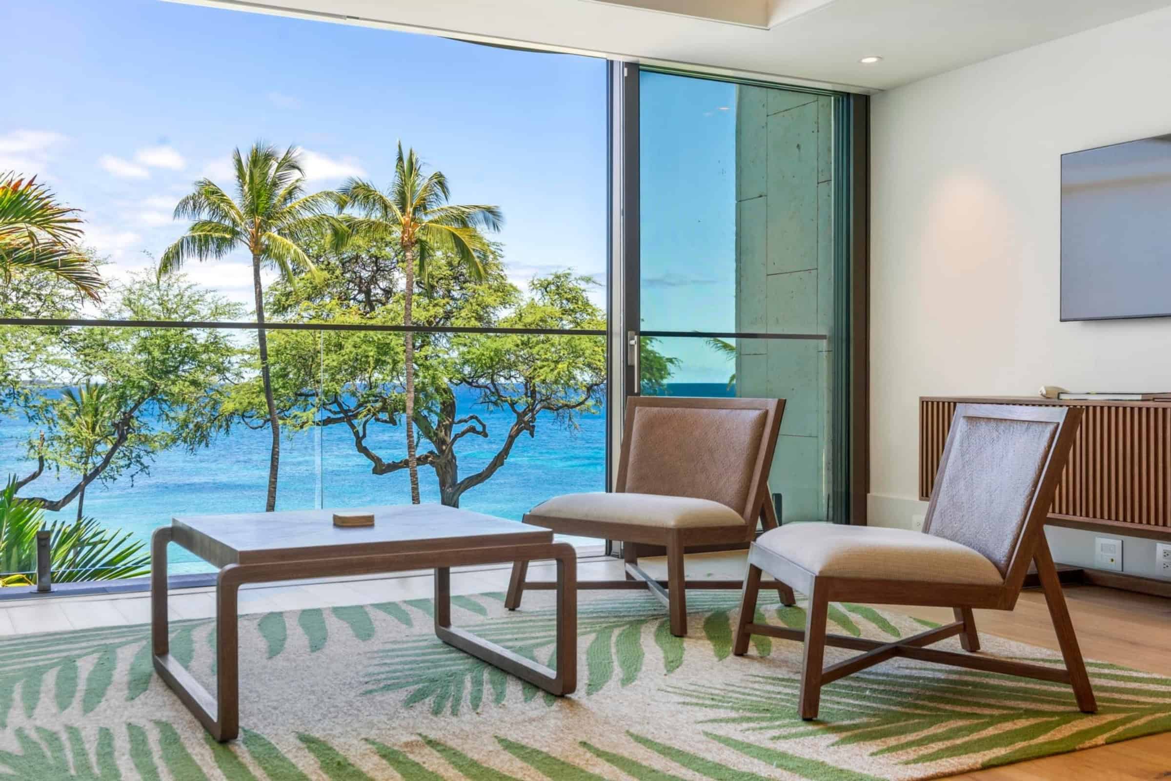 Oceanfront condo with balcony view of the Pacific in Kohala Coast, Big Island Hawaii.