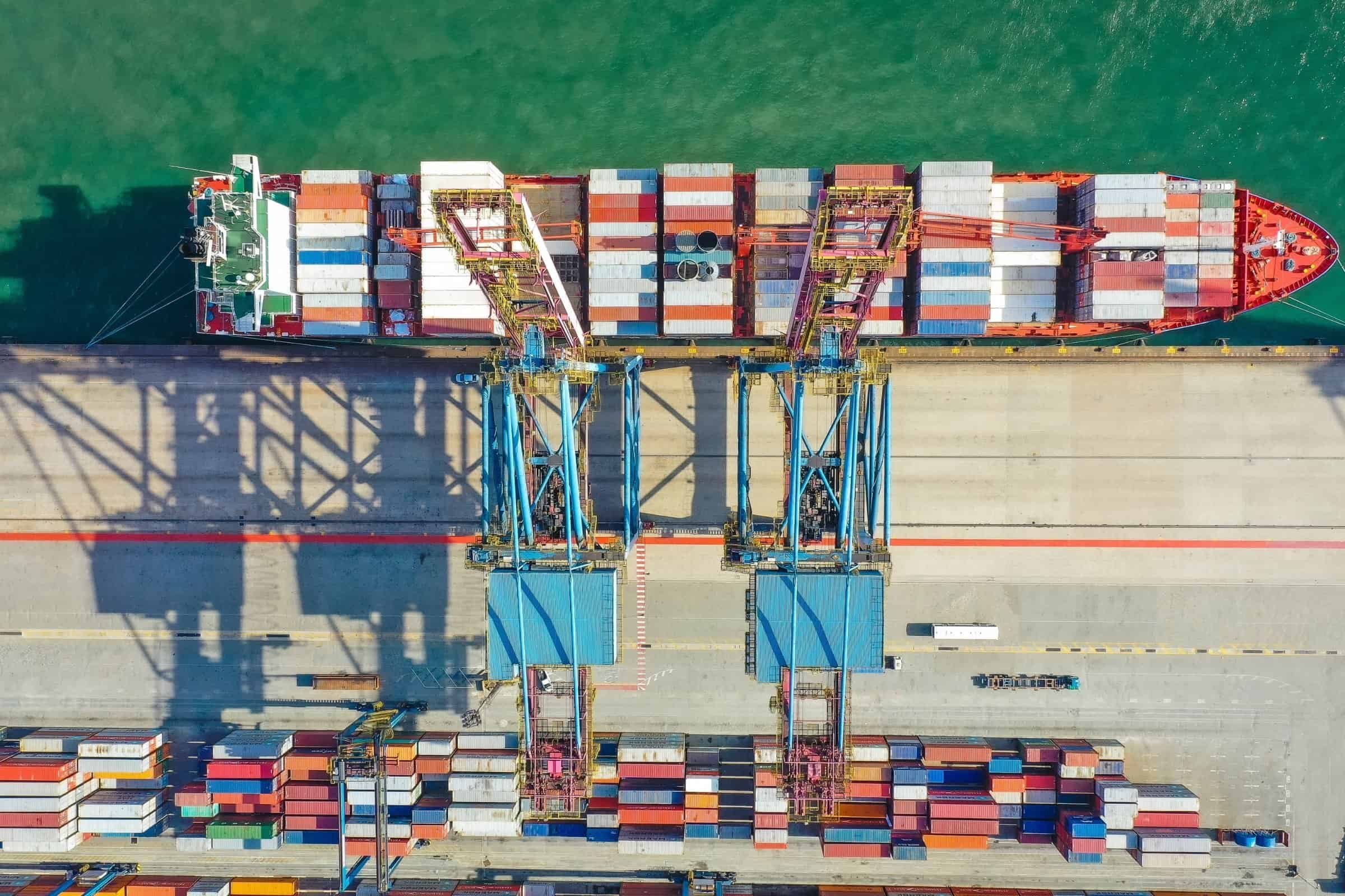 Cargo ship at port in Kona, Big Island Hawaii, showcasing oceanfront property potential.