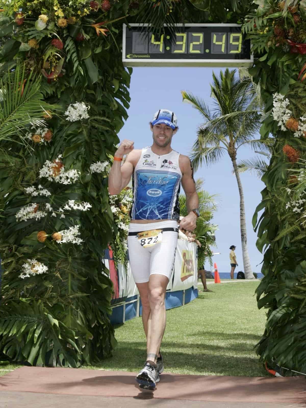 Penn Henderson wearing a lei at the finish of the Honu 70.3 at Waikoloa.
