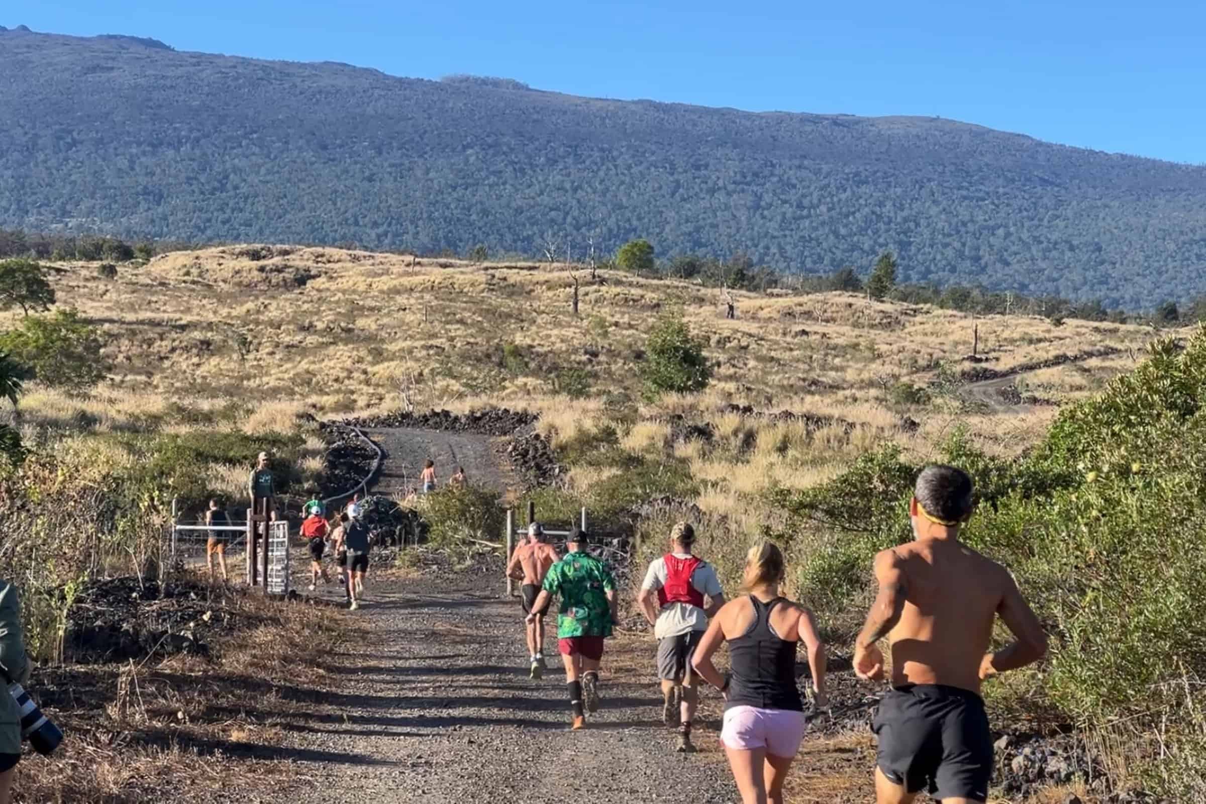 Runners heading down a lava trail toward the coast at the Run for the Dry Forest.