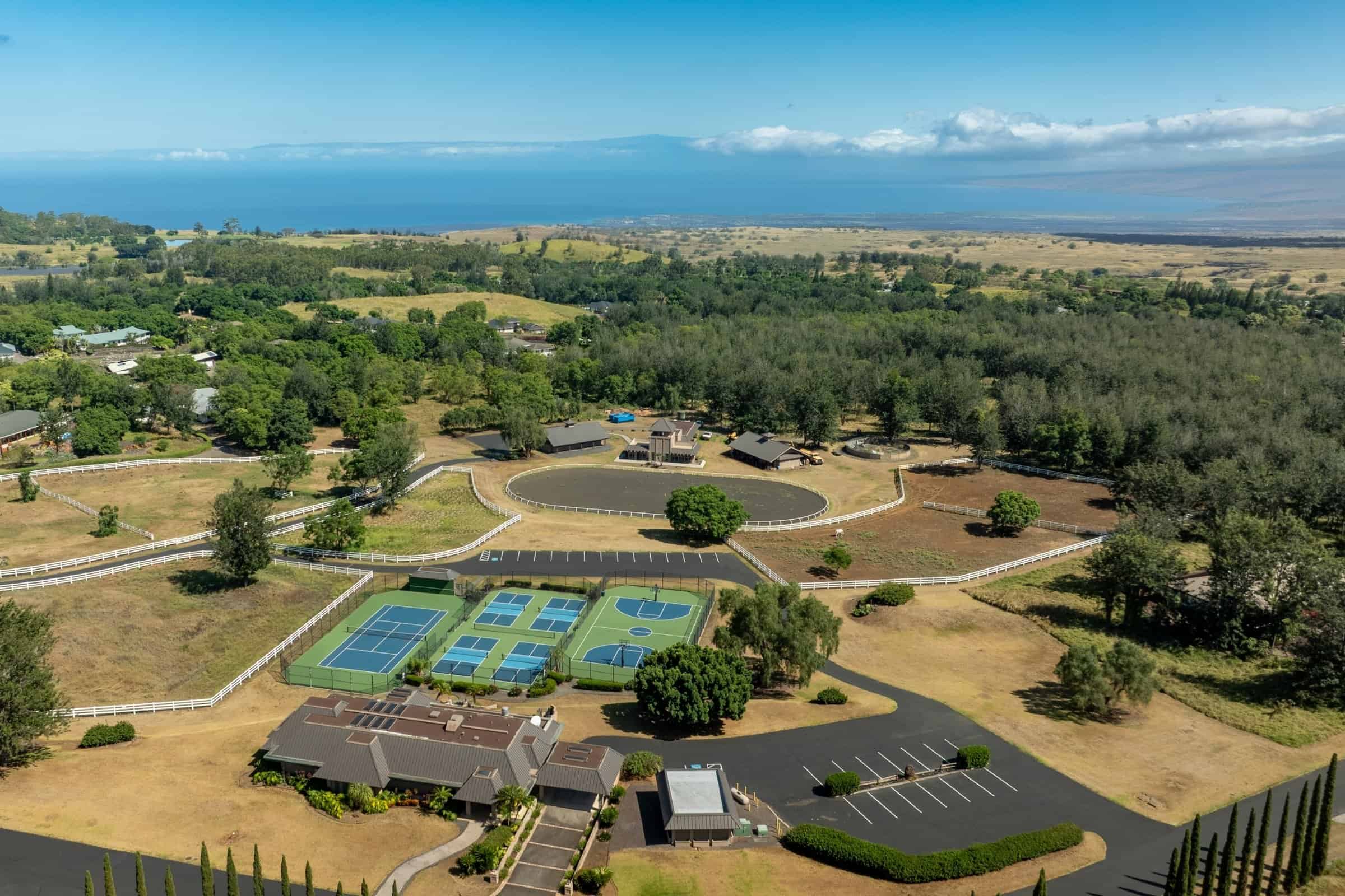 Luxury resort community on Big Island Hawaii with tennis courts and ocean views near Kona.